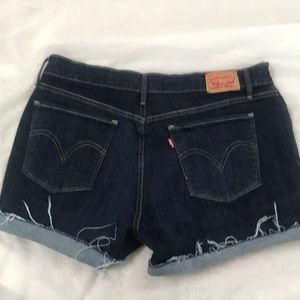 Levi’s 515 distressed edge cutoffs Size 14